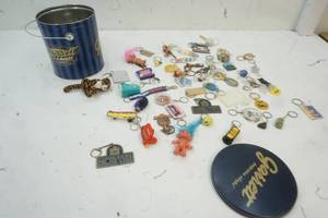 lot 307 image: Tin Can with Variety of Keychains