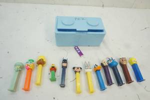 lot 318 image: Variety of Pezs with Blue container