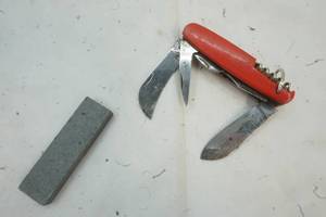 lot 366 image: Imperial Multipurpose Pocket Knife with Stone Sharpener