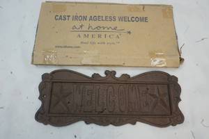 lot 379 image: Cast Iron Ageless Welcome sign