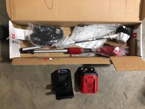 lot 12 image: Toro 60V MAX 14 in. (35.5 cm)  16 in. (40.6 cm) Brushless String Trimmer with 2.5Ah Battery Customer Returns See Pictures