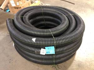 lot 38 image: Advanced Drainage Systems 4 in. x 100 ft. Singlewall Solid Drain Pipe  Customer Returns See Pictures