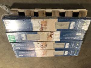 lot 4 image: 8 Boxes of Lifeproof Laurel Coast 7.6 in. W x 50.6 in. L Waterproof Hybrid Resilient Flooring (21.2 sqftcase) Customer Returns See Pictures