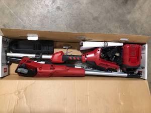 lot 21 image: Toro 60V MAX 10 in. (25.4 cm) Brushless Pole Saw with 2.0Ah battery  Customer Returns See Pictures