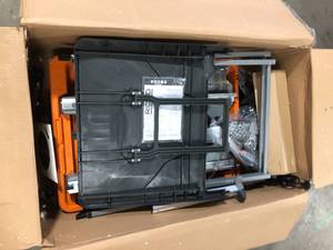 lot 40 image: Ridgid 8 in. Wet Tile Saw with Stand  Customer Returns See Pictures