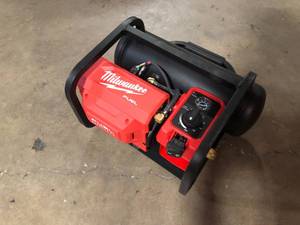 lot 44 image: Milwaukee M18 FUEL 18-Volt Lithium-Ion Brushless Cordless 2 Gal. Electric Compact Quiet Compressor (Tool-Only) Customer Returns See Pictures