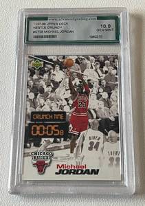 lot 12 image: Michael Jordan Graded 10 Gem Mint 1997-98 Upper Deck Nestle Crunch #CT05 Basketball Card