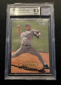 lot 80 image: Hideo Nomo Jersey Fusion Card Graded Beckett 8.5 - 1998 Fleer Tradition #504 with Game-Used Jersey Baseball Card