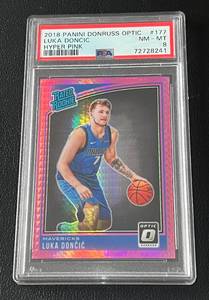 lot 107 image: Luka Doncic Hyper Pink 2018 Donruss Optic Rated Rookie #177 PSA Graded 8 NM-MT Rookie Basketball Card