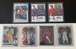 lot 192A image: NBA Rookies 7 Card Lot - Cole Anthony. Daniel Oturu (2), Kenyon martin Jr., Quentin Grimes, Jalen Green, and Tyler Bey RCs