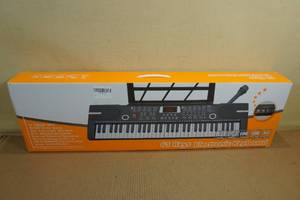 lot 113 image: Camide 61 Keys Electronic Keyboard