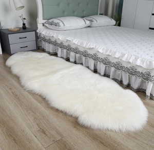lot 36 image: Ogland 2x6 Genuine Sheepskin Area Rug -Ivory White
