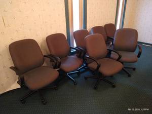 lot 46 image: Seven Rolling Conference Chairs