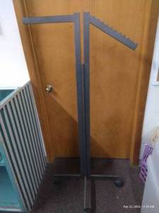 lot 69 image: Rolling 2-Arm Clothes Rack