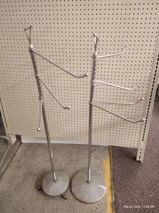 lot 88 image: (2) Metal Clothes Hanger Stands With Moving Arms