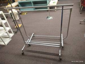 lot 104 image: (2) Rolling Clothes Rack