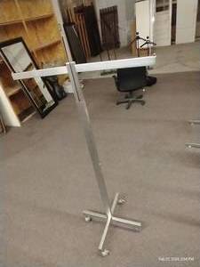 lot 125 image: Rolling 2-Arm Clothes Rack