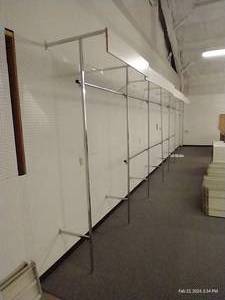 lot 139 image: Installed Metal Clothes Hanging System