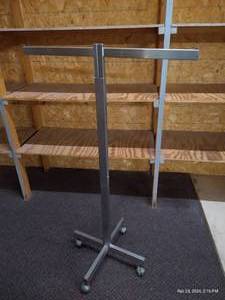 lot 211 image: 180 Rolling Clothes Rack