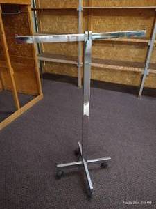 lot 219 image: Two Arm 180 Rolling Clothes Rack