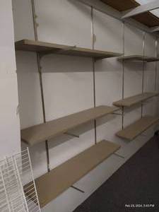 lot 242 image: Long Wall of Shelves