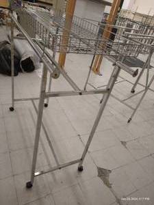 lot 266 image: Double Pole Clothes Rack w Upper Basket