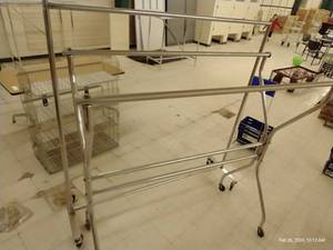 lot 276 image: Two Rolling Double Pole Clothes Racks
