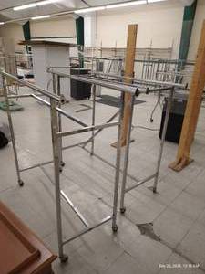 lot 278 image: Two Rolling Double Pole Clothing Racks
