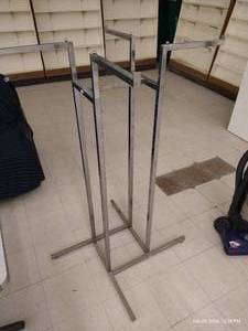 lot 319 image: Square 4-Way Clothes Display Rack