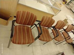 lot 357 image: Four Orange Striped Office Chairs