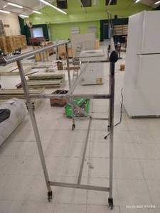 lot 385 image: Double Pole Rolling Clothes Rack
