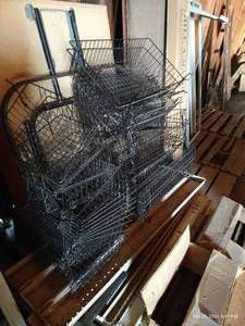 lot 450 image: Tall Stack Peg Board Wire Baskets