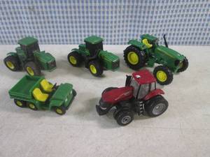 lot 166 image: (G-1) John Deere and A Case Toy Tractors