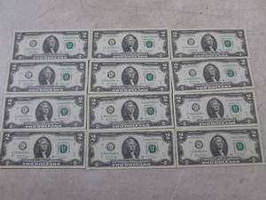 lot 314 image: (CNTR) 12 Uncirculated Consecutive Serial Number $2.00 Bills