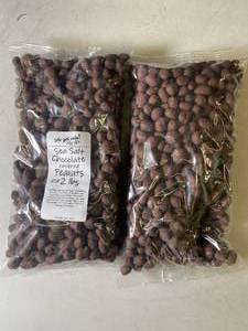 lot 148 image: Sea Salt Chocolate Covered Nuts 2Lbs - 2 Bags Best by 05022024