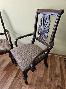lot 25 image: Ashley Furniture Armed Carved Accent Chairs
