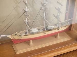 lot 99A image: Model Sailing Ship in Rich Wood Display Case