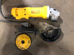 DEWALT 11 Amp Corded 4.5 in. Small Angle Grinder  Customer Returns See Pictures