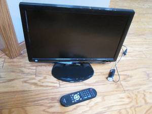 lot 6 image: Sharp 19 flat-screen TV with additional antenna and remote