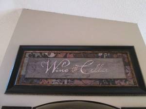 lot 8 image: Large Cherry toned framed wall decor plaque