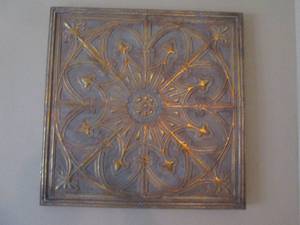 lot 16 image: Coppery tone Tin wall decor approximately 2828