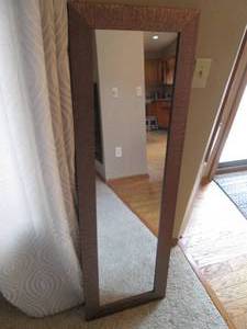 lot 23 image: Full length Mirror with a decorative metal tone frame