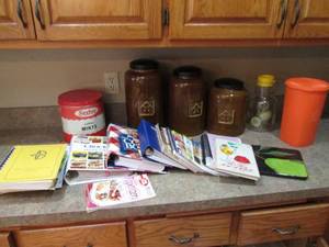 lot 28 image: Countertop Collection of Cookbooks and lidded Canisters