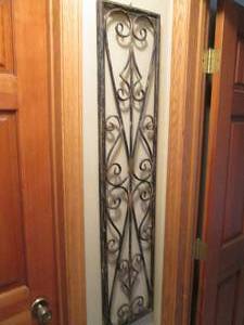 lot 37 image: Metal scrolling wall decor approximately 3612