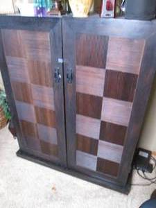 lot 54 image: Deep tone Wood 2-door multi-purpose cabinet featuring turned wood tile like inlay designed door fronts, 2-drawers and 3-tiers of concealed shelving approximately 402150