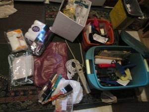 lot 91 image: Storage tote and misc containers with a variety of paint brushes, sponges, rollers, tape and other aids and supplies PLUS clamps, multi-tools, yardsticks, small garbage Bins and other household supplies and accessories