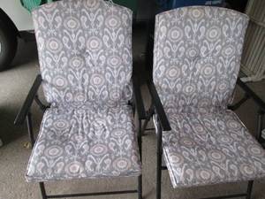 lot 127 image: 2 folding padded patio chairs...