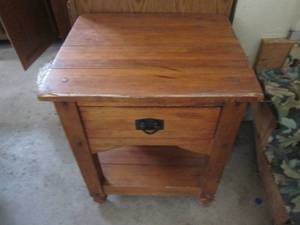 lot 134 image: Solid wood end table...
