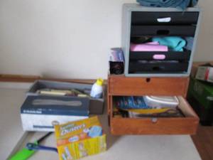 lot 135 image: Garage organizers with supplies including sand paper office supplies and clamps