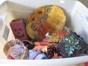 lot 143 image: Covered tote of fall and Halloween decor